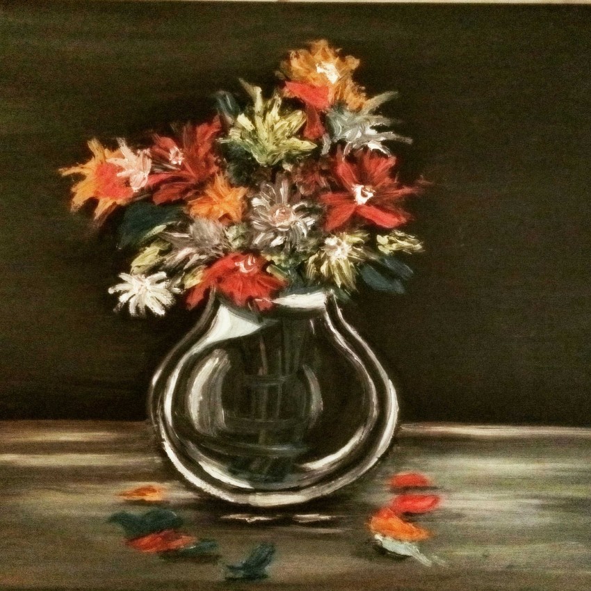 زهور في زهرية زجاجية