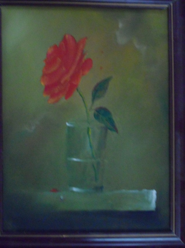 Red Rose In A Glass Cup