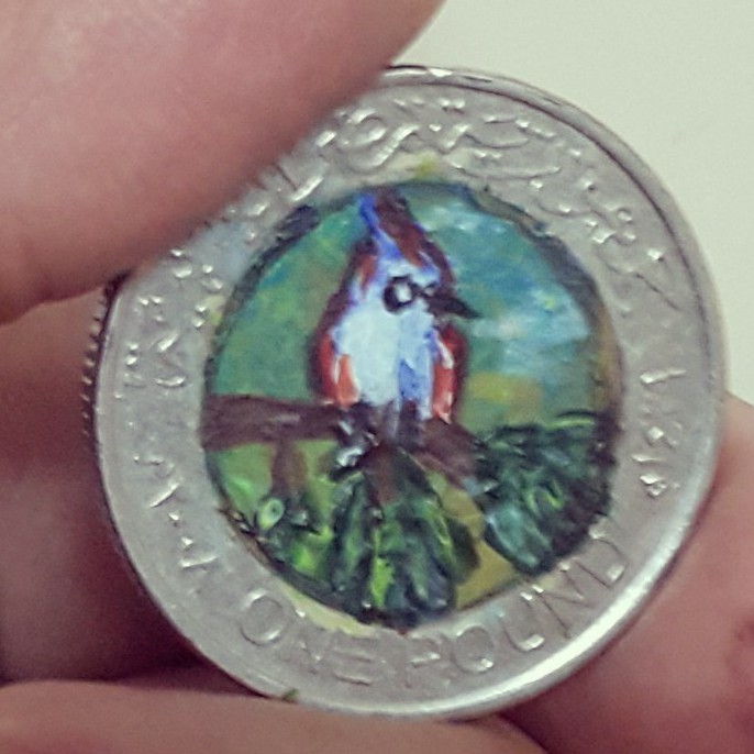Tiny Bird On A Coin
