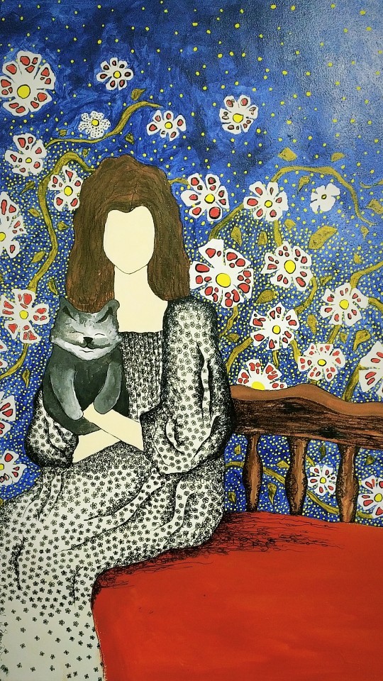 الفتاة مع القطة